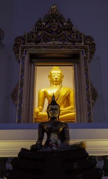 Buddha statue in temple of Thailand. Peacefulness. Inner peace concept idea abstract