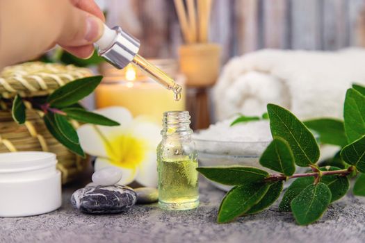 Background spa cosmetics and oils and herbs. Selective focus. Nature.