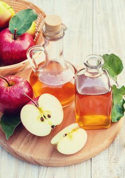 Apple cider vinegar in a bottle. Selective focus. nature.