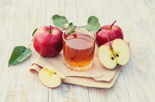 Apple juice in a glass. Selective focus. nature.
