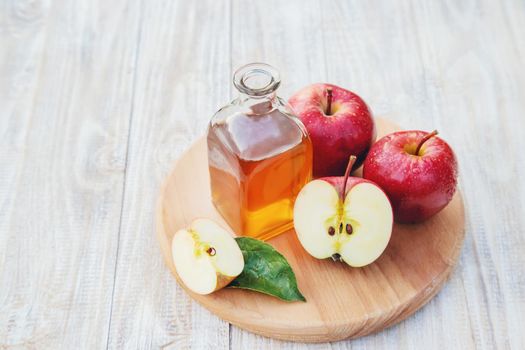 Apple cider vinegar in a bottle. Selective focus. nature.