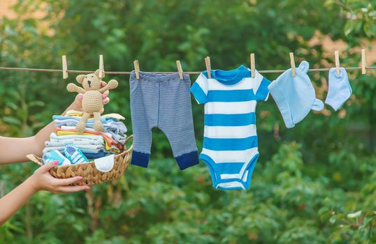 washing baby clothes. Linen dries in the fresh air. Selective focus. nature.