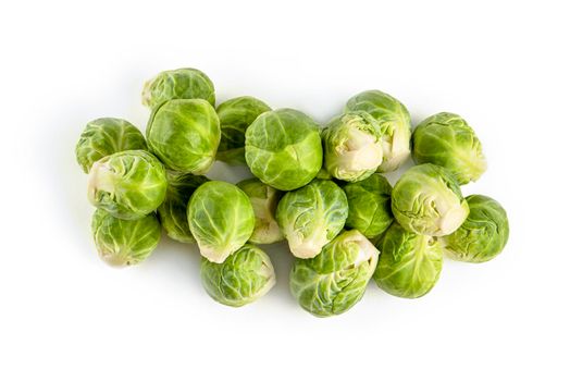 Brussels sprouts, isolate. Fresh, small Brussels sprouts stacked in a stack on a white isolated background