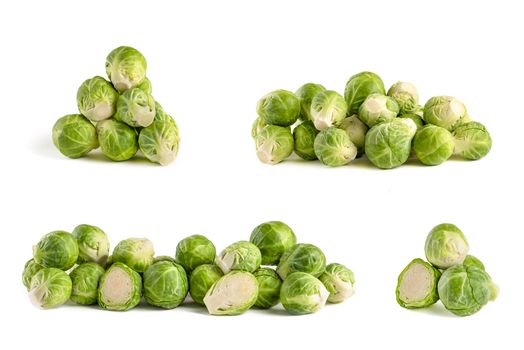 Brussels sprouts. Set of fresh brussels sprouts in stacks on white isolated background. Deep focus stacking