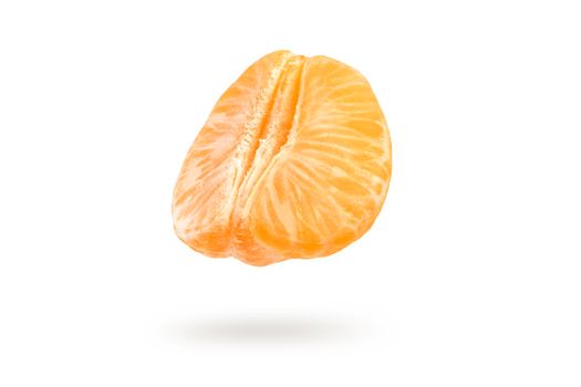A piece of mandarin isolated on a white background, falling casting a shadow. Individual segments of tangerine slices, for inserting into a project or design