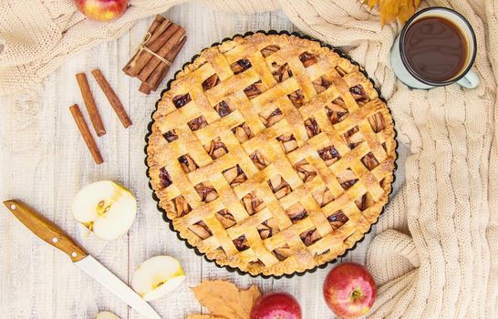 Pie with apples and cinnamon. Selective focus. Food.
