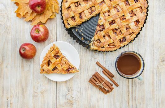Pie with apples and cinnamon. Selective focus. Food.