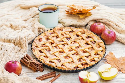 Pie with apples and cinnamon. Selective focus. Food.