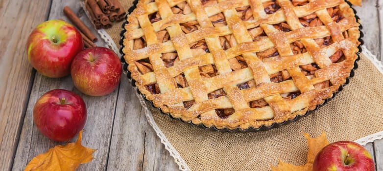 Pie with apples and cinnamon. Selective focus. Food.