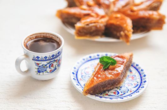 Turkish coffee and baklava on the table. Selective focus. nature.