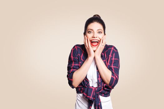 People, happiness and success concept. Beautiful girl screaming with amazement and joy, gesturing with her hands while passing final exams with excellent marks. Body language.