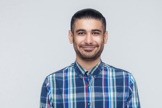 Happiness bearded businessman smiling into camera. Businessman with beard grinning having positive look. Studio shot