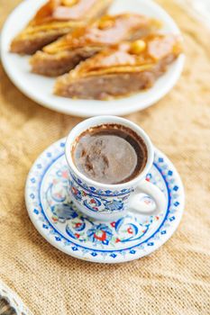 Turkish coffee and baklava on the table. Selective focus. nature.