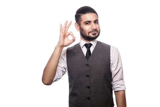 Handsome businessman on white background.