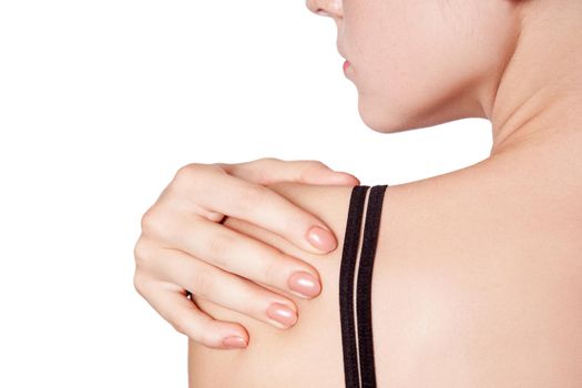 young woman with pain on her arm and shoulder on white background.