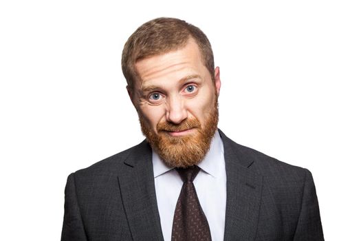 Unhappy dissatisfied businessman. isolated on white, looking at camera.