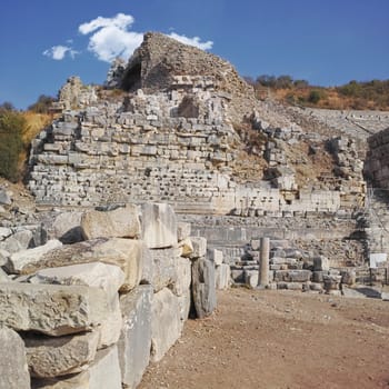 Ancient city ruins of Ephesus in Turkey during the day. Travel abroad and overseas for holiday, vacation and tourism. Excavated remains of historical building stone from Turkish history and culture.