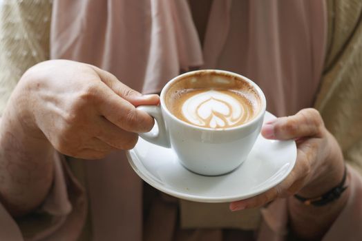 young women drinking late coffee ,