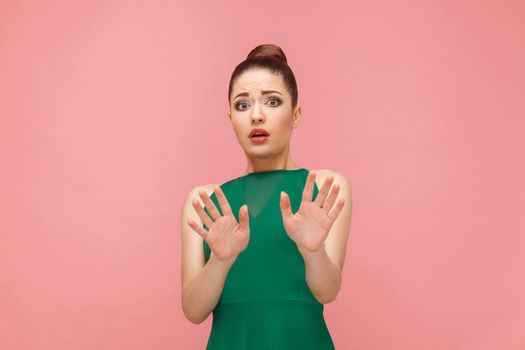 No! Fear reaction of beautiful woman . Expression emotion and feelings concept. Studio shot, isolated on pink background