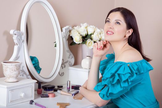 Young beautiful woman with dress apply makeup. beauty and healthcare concept. .