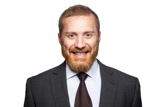 Happy smilely businessman looking at camera with toothy smile. isolated on white, looking at camera.