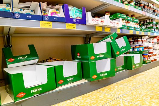 DUNGLOE / IRELAND - MARCH 17 2020 : The noodles shelves are empty during the coronavirus outbreak.