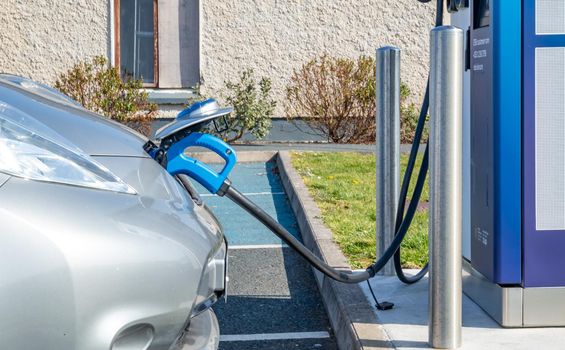 Dungloe, County Donegal, Ireland - April 10 2022 : Electric Car on charching station.