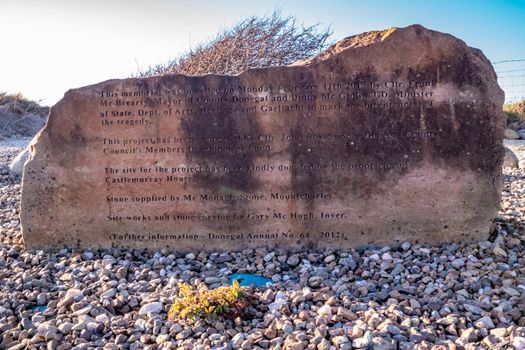 DUNKINEELY, COUNTY DONEGAL, IRELAND - APRIL 10 2022 : Stones remembering fisherman who lost their lives in a sudden storm.