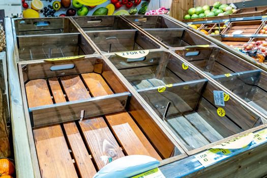 DUNGLOE / IRELAND - MARCH 17 2020 : The vegetables shelves are empty during the coronavirus outbreak.