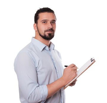 Businessman Writing on a Clipboard, Isolated. Young Man with Hair Bun. Stock image