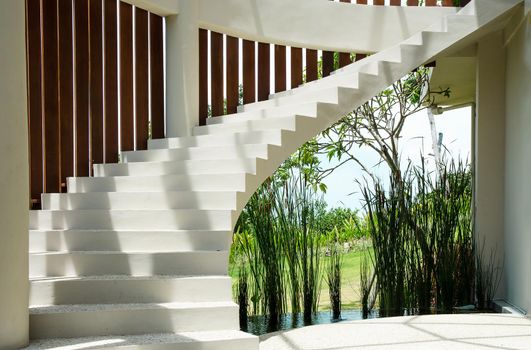 White spiral staircase overlooking the street. Stock image