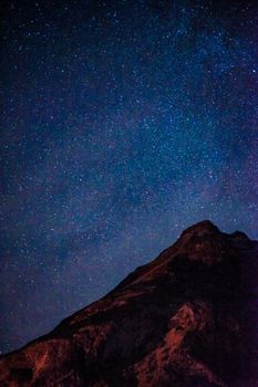 Starry sky and Iceland snowy mountain. Shooting Location: Iceland, Lay Cavik