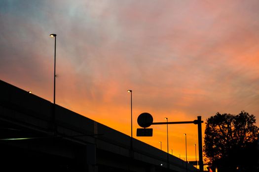 Silhouette of sunset and electric wire and building. Shooting Location: Yokohama-city kanagawa prefecture