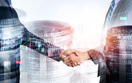Business handshake on finance prosperity and money technology asset background . Economy and financial growth by investment in valuable stock market to gain wealth profit form currency trading