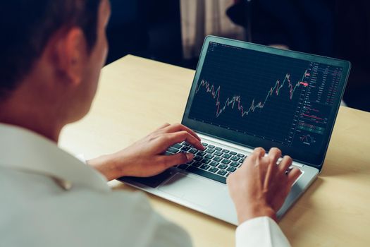 Stock market data chart analysis by ingenious computer software . Investment application display stock market chart on the computer screen and advise trading decision .