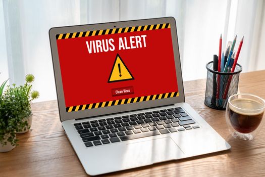 Virus warning alert on computer screen detected modish cyber threat , hacker, computer virus and malware