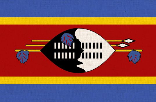 Flag of Eswatini. Eswatini flag on fabric surface. Fabric texture. National symbol of African Republic Eswatini on patterned background. Kingdom of Eswatini