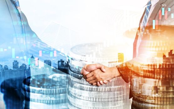 Business handshake on finance prosperity and money technology asset background . Economy and financial growth by investment in valuable stock market to gain wealth profit form currency trading