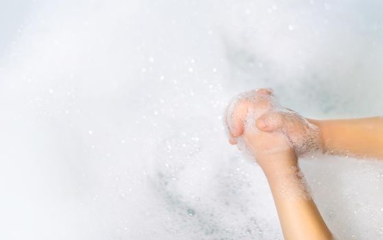Wash hands thoroughly with soapy water. Selective focus. Hands.