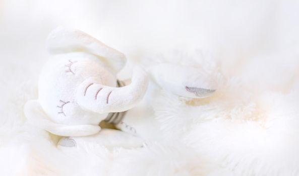 The little plush toy is sleeping. Selective focus. nature.