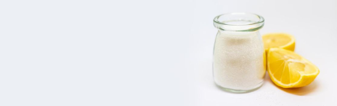 Citric acid on a white isolated background. Selective focus. Food.