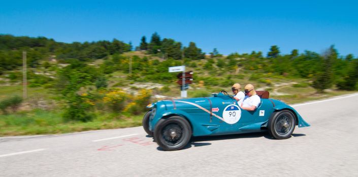 URBINO, ITALY - JUN 16 - 2022 : DELAHAYE 135 CS 1935 on an old racing car in rally Mille Miglia 2022 the famous italian historical race (1927-1957 on an old racing car in rally Mille Miglia 2022 the famous italian historical race (1927-1957