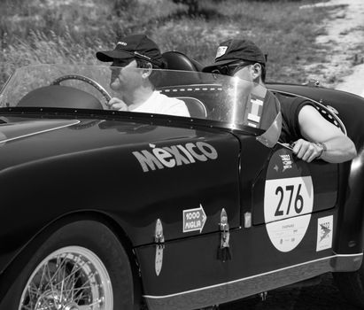 URBINO, ITALY - JUN 16 - 2022 : FERRARI 166 MM SPIDER VIGNALE 1953 on an old racing car in rally Mille Miglia 2022 the famous italian historical race (1927-1957