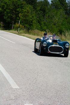 URBINO, ITALY - JUN 16 - 2022 : COOPER BRISTOL T25 BRISTOL 1953 on an old racing car in rally Mille Miglia 2022 the famous italian historical race (1927-1957