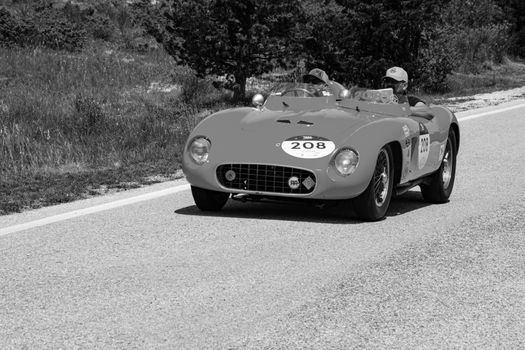 URBINO, ITALY - JUN 16 - 2022 : FERRARI 500 TR SPIDER SCAGLIETTI 1956 on an old racing car in rally Mille Miglia 2022 the famous italian historical race (1927-1957