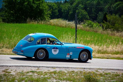 URBINO, ITALY - JUN 16 - 2022 : TALBOT-LAGO T26 GS 1950 on an old racing car in rally Mille Miglia 2022 the famous italian historical race (1927-1957