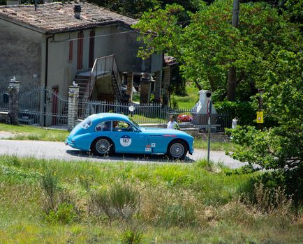 URBINO, ITALY - JUN 16 - 2022 : TALBOT-LAGO T26 GS 1950 on an old racing car in rally Mille Miglia 2022 the famous italian historical race (1927-1957