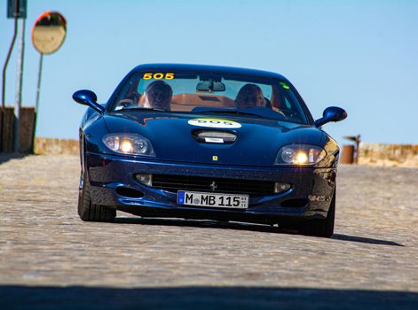 URBINO, ITALY - JUN 16 - 2022 : FERRARI TRIBUTE Ferrari 550 Maranello IN an old racing car in rally Mille Miglia 2022