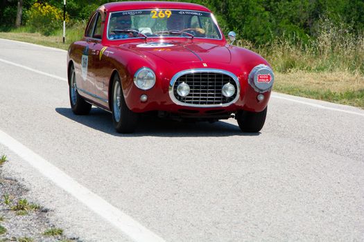 URBINO, ITALY - JUN 16 - 2022 : FERRARI 212 INTER EUROPA PINIFARINA 1953 on an old racing car in rally Mille Miglia 2022 the famous italian historical race (1927-1957