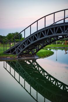 Pond with reflection in golf grassland